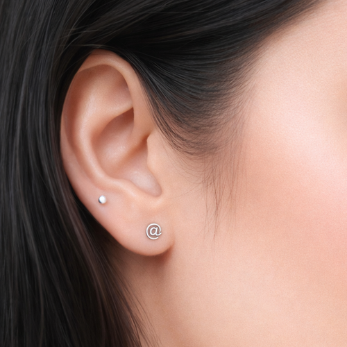 @ Symbol Stud Earrings